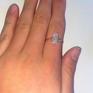 silver ring with a crystal.